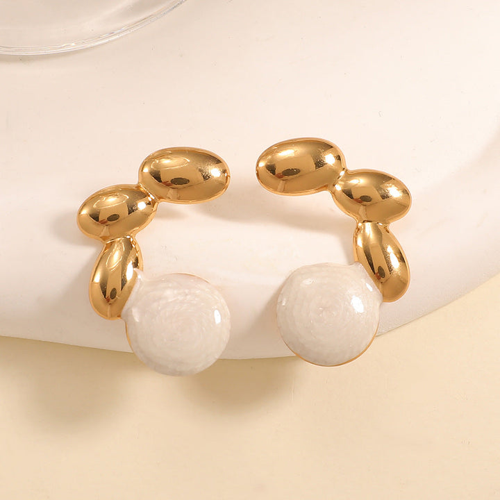 Ladies earrings in elegant shell design Nin Boutique 1784077119