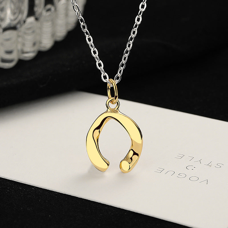 Ladies necklace with filigree lucky charm pendant Nin Boutique