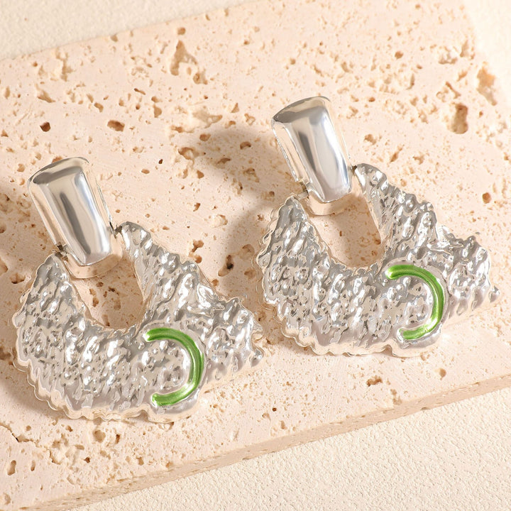 Women's earrings in artistic relief design Nin Boutique
