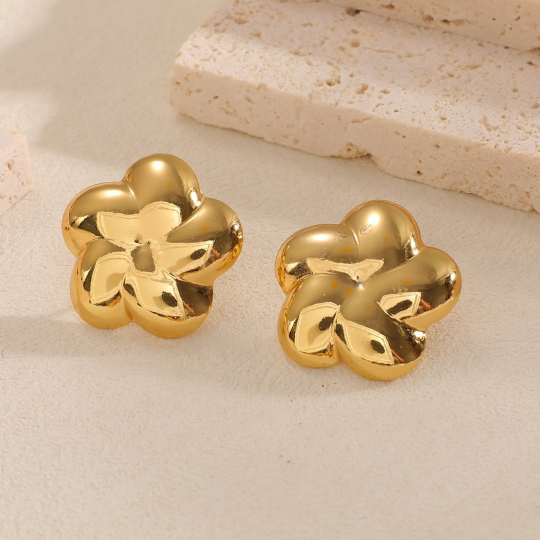 Ladies earrings with modern spiral pattern Nin Boutique