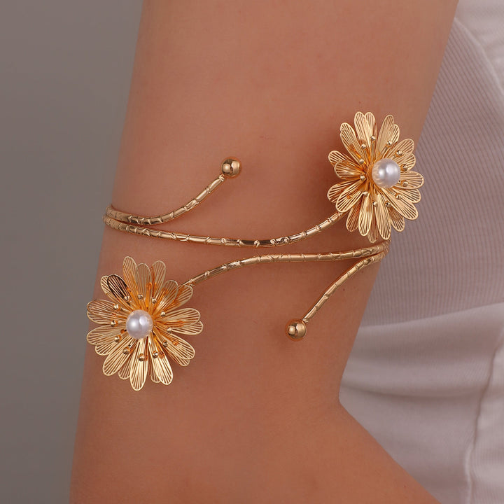 Ladies elegant arm jewelry with floral motifs Nin Boutique