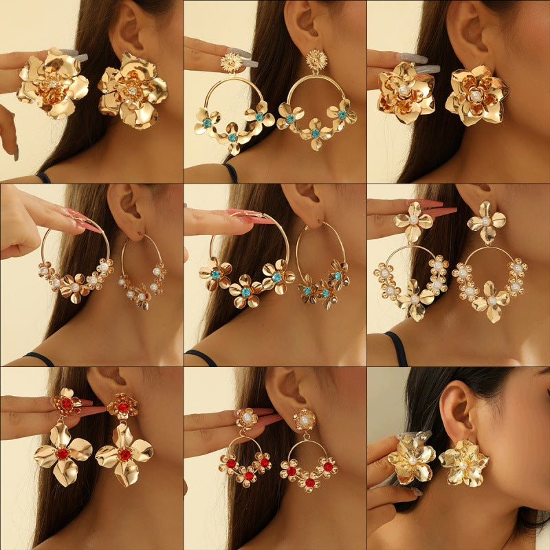 Women's earrings in luxurious floral pattern with pearl accents Nin Boutique