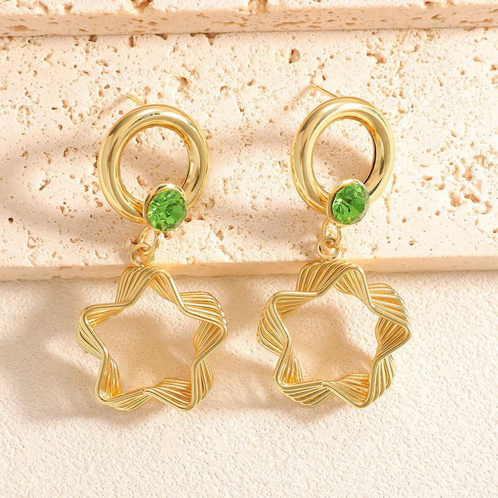 Ladies earrings with elaborate star design Nin Boutique