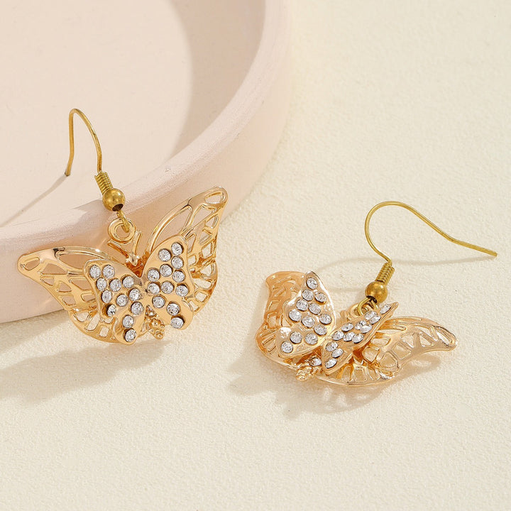 Ladies earrings with intricate butterfly design Nin Boutique