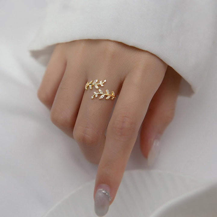 Women's ring with delicate leaf design and sparkling zirconia elements Nin Boutique