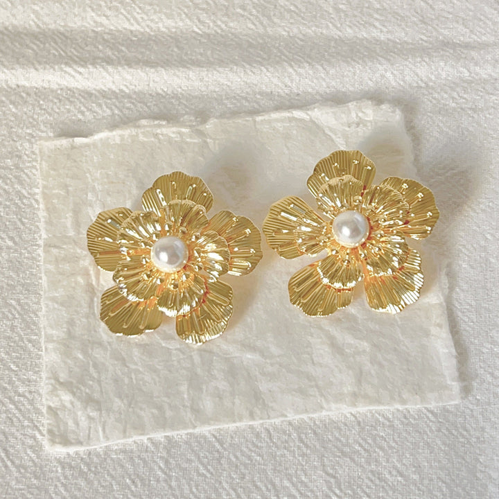 Women's earrings with artistic flower design and pearl accents Nin Boutique
