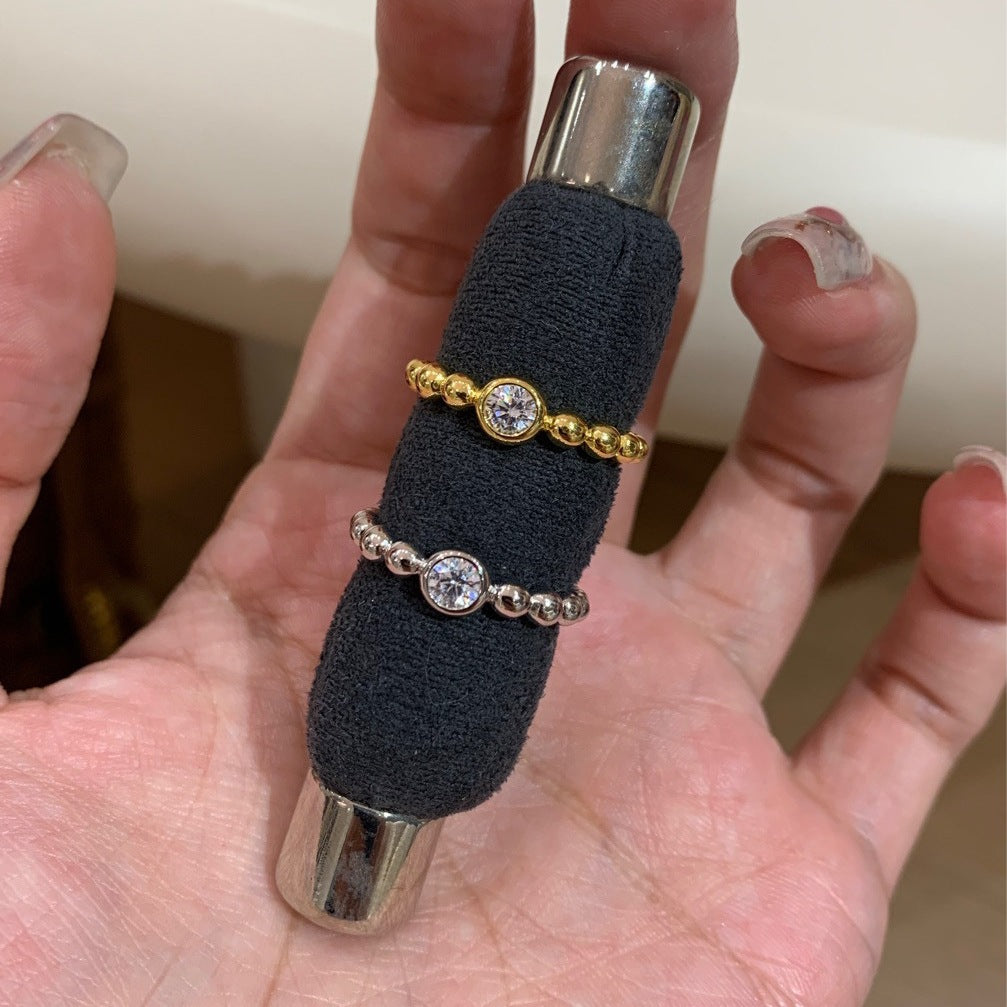 Ladies ring with sparkling zirconia details and elegant ball design Nin Boutique