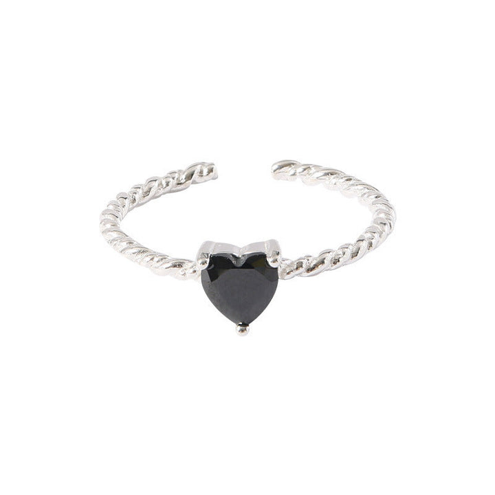 Ladies ring with heart-shaped onyx and playful design Nin Boutique