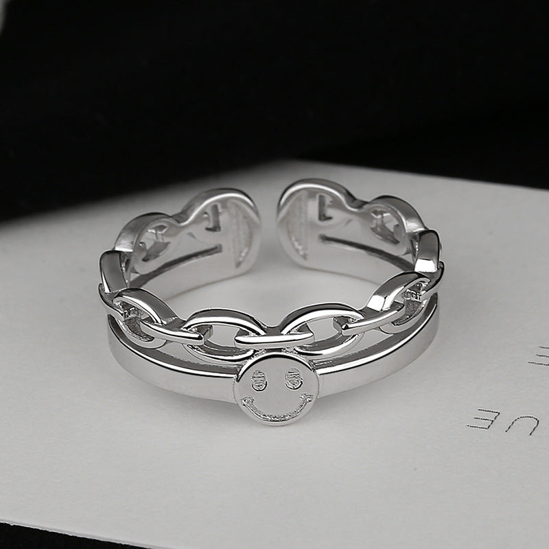 Women Open Ring with innovative Salmon Smiley design and curved chain detail Nin Boutique