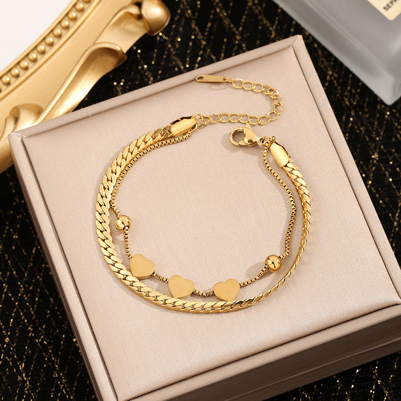 Ladies ankle bracelet with playful heart design and elegant chain style Nin Boutique