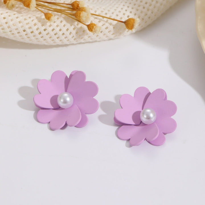 Women's earrings with vibrant floral design and stylish pearl accents Nin Boutique