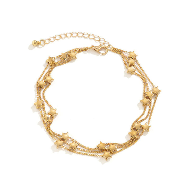 Ladies glamorous anklet with sparkling stars Nin Boutique