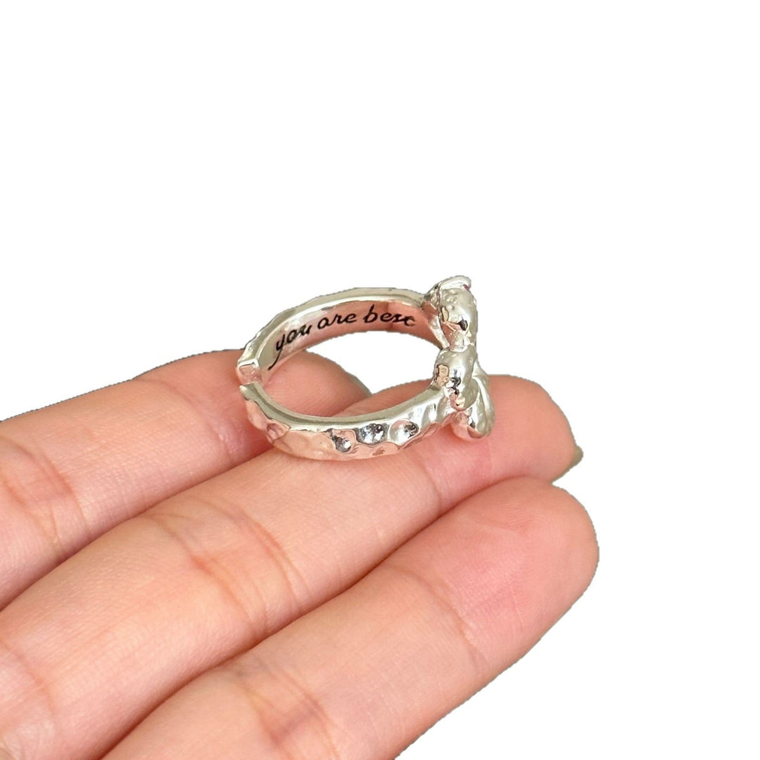 Women's ring with delicate floral pattern and sparkling accent Nin Boutique
