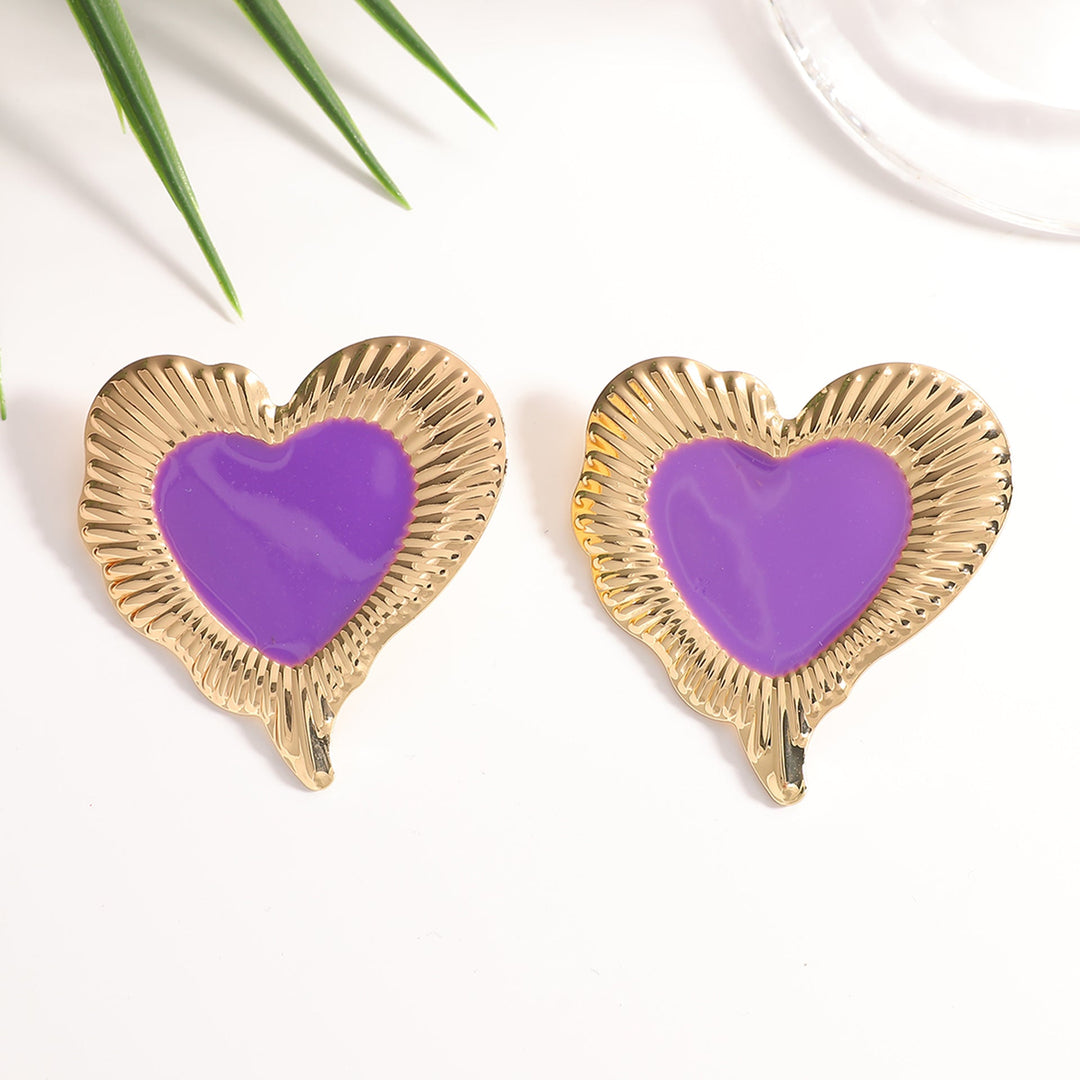 Ladies earrings in heart-shaped, glamorous design Nin Boutique