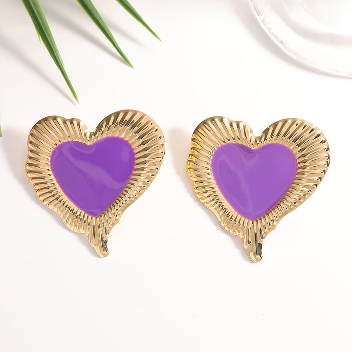 Ladies earrings in heart-shaped, glamorous design Nin Boutique