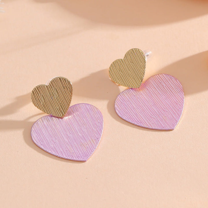 Ladies earrings in modern heart design Nin Boutique
