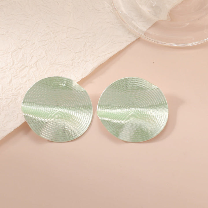 Ladies earrings in elegant shell design Nin Boutique