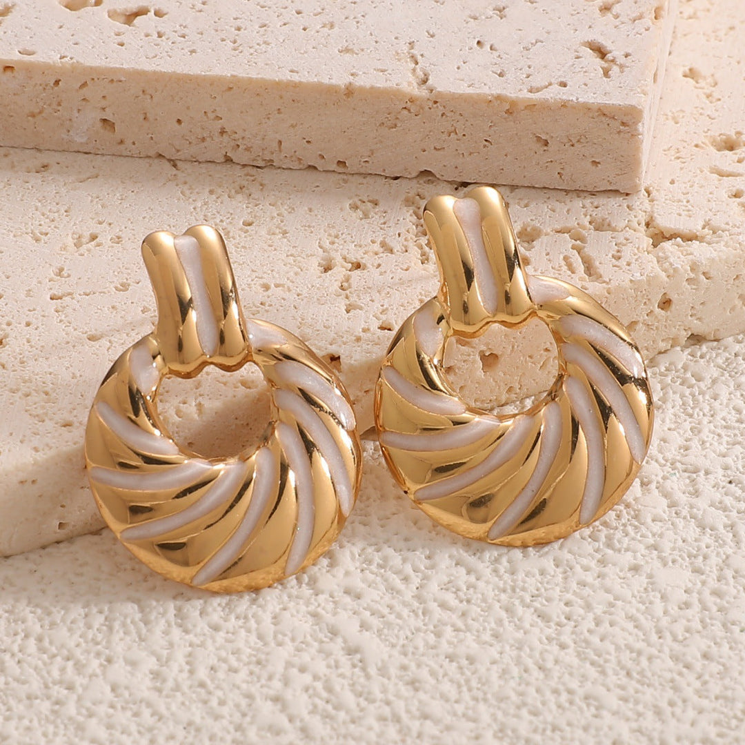 Women's earrings with elegant, sculptural design Nin Boutique