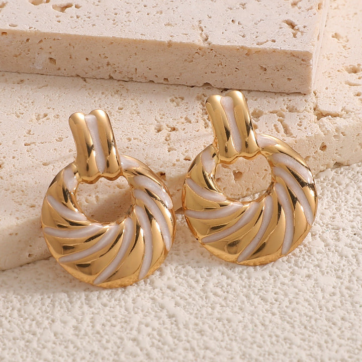Women's earrings with elegant, sculptural design Nin Boutique
