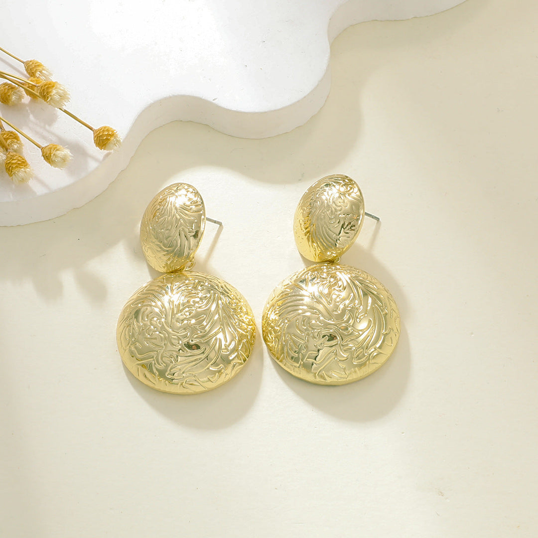 Ladies earrings in elegant relief design Nin Boutique