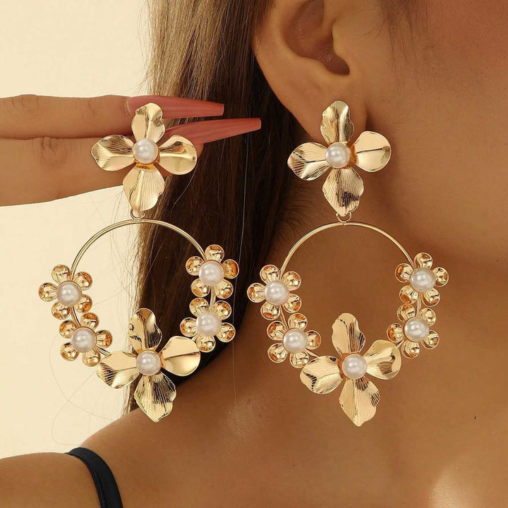 Women's earrings in luxurious floral pattern with pearl accents Nin Boutique