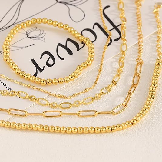 Ladies ankle bracelet with sparkling gold-colored beads and elegant design Nin Boutique