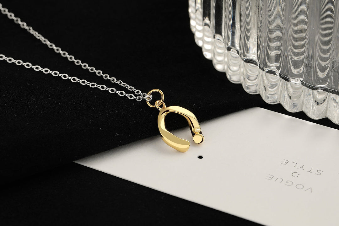Ladies necklace with filigree lucky charm pendant Nin Boutique