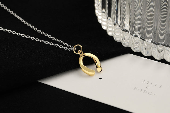 Ladies necklace with filigree lucky charm pendant Nin Boutique