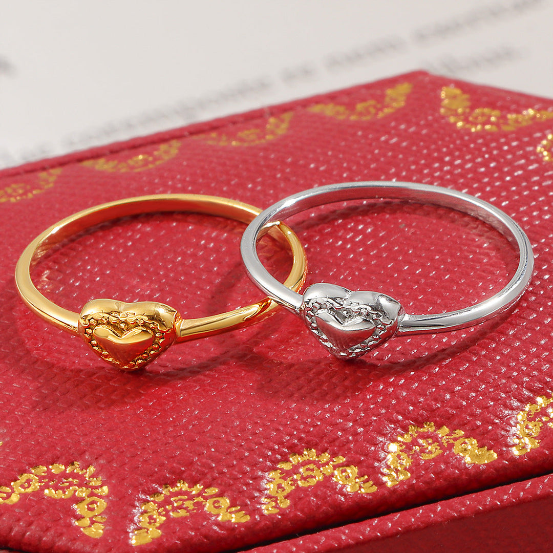 Ladies' delicate ring with heart-shaped design and sparkling accents Nin Boutique