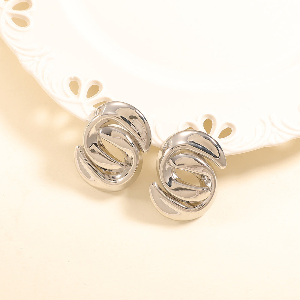 Ladies earrings with elegant, curved design Nin Boutique 1784077352