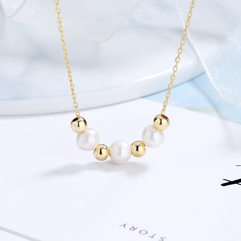 Women's necklace with radiant pearls and stylish silver accents Nin Boutique