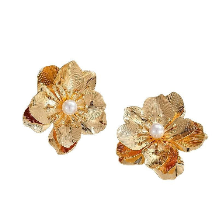 Women’s earrings with artistic floral motif and elegant pearl accents Nin Boutique