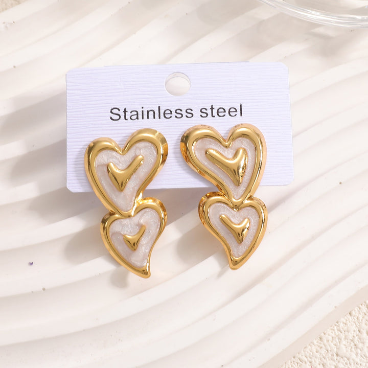 Ladies earrings in playful heart design Nin Boutique