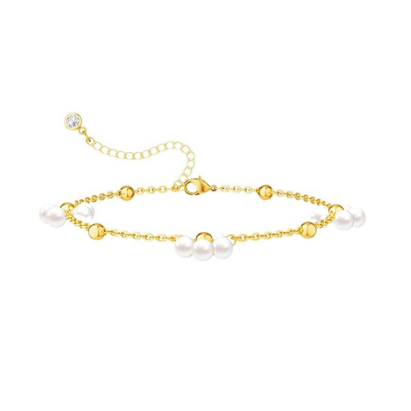 Women's ankle bracelet with elegant pearls and golden accents Nin Boutique