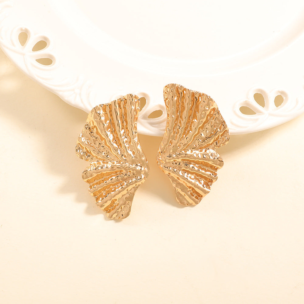 Ladies earrings with stylish shell design and antique finish Nin Boutique