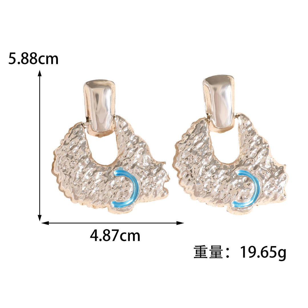 Women's earrings in artistic relief design Nin Boutique