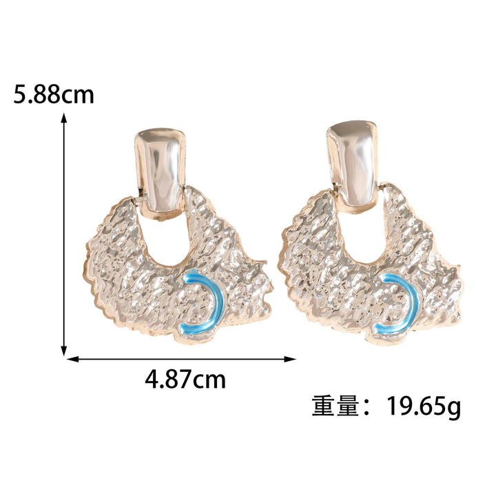 Women's earrings in artistic relief design Nin Boutique