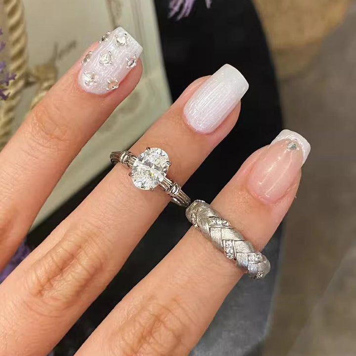 Ladies ring with elaborate oval crystal and elegant wire design Nin Boutique