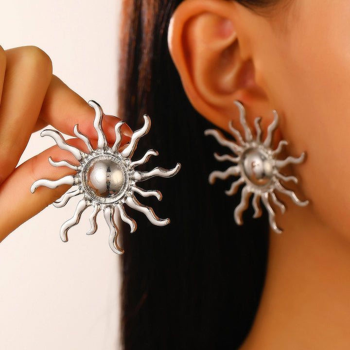 Ladies' earrings in artistic sun design Nin Boutique