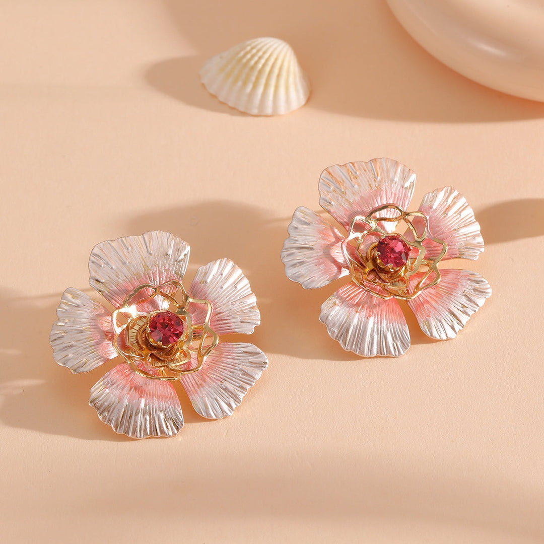 Ladies stud earrings in an artistic flower design Nin Boutique