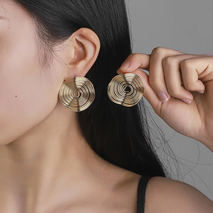 Ladies earrings with spiral design Nin Boutique