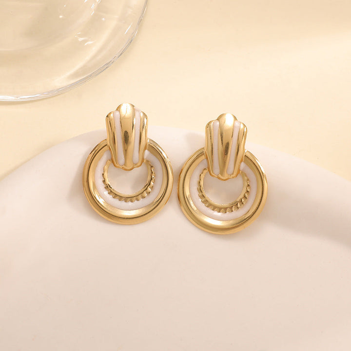 Ladies earrings in elegant shell design Nin Boutique