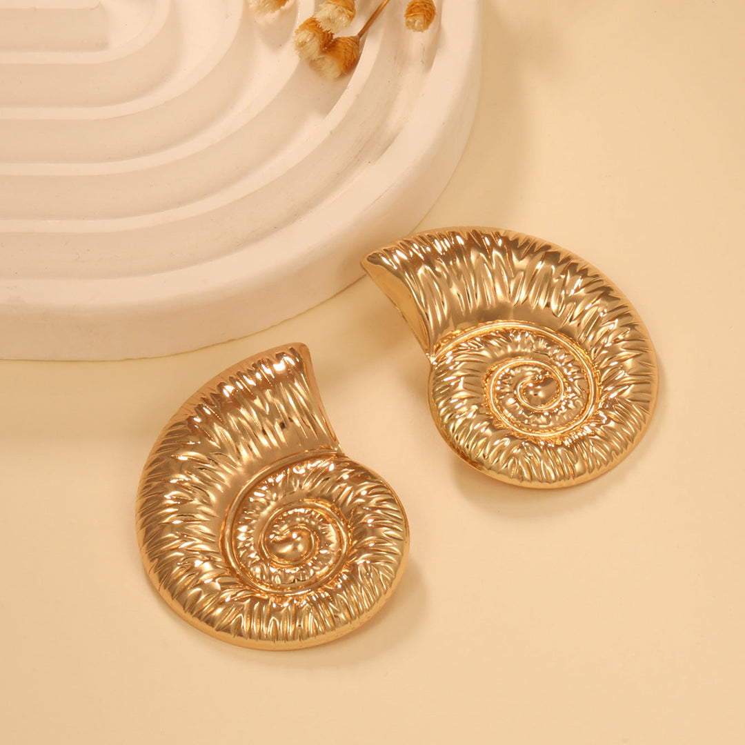Ladies earrings in elegant shell design Nin Boutique