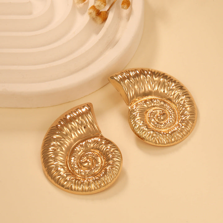 Ladies earrings in elegant shell design Nin Boutique