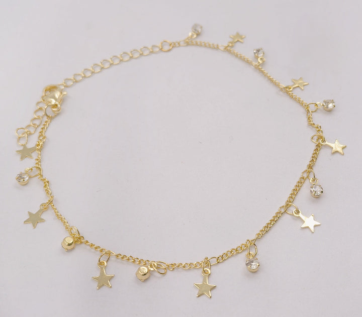 Ladies ankle bracelet with sparkling crystal pendants and delicate gold design Nin Boutique