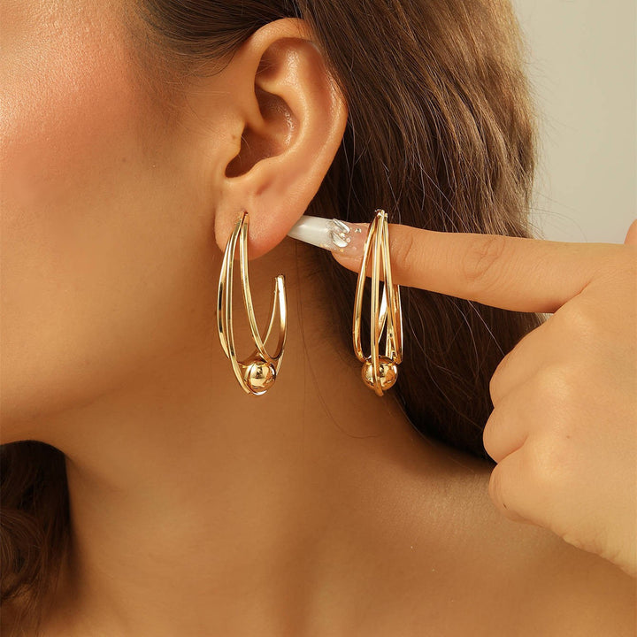 Women's earrings with elegant, curved lines Nin Boutique