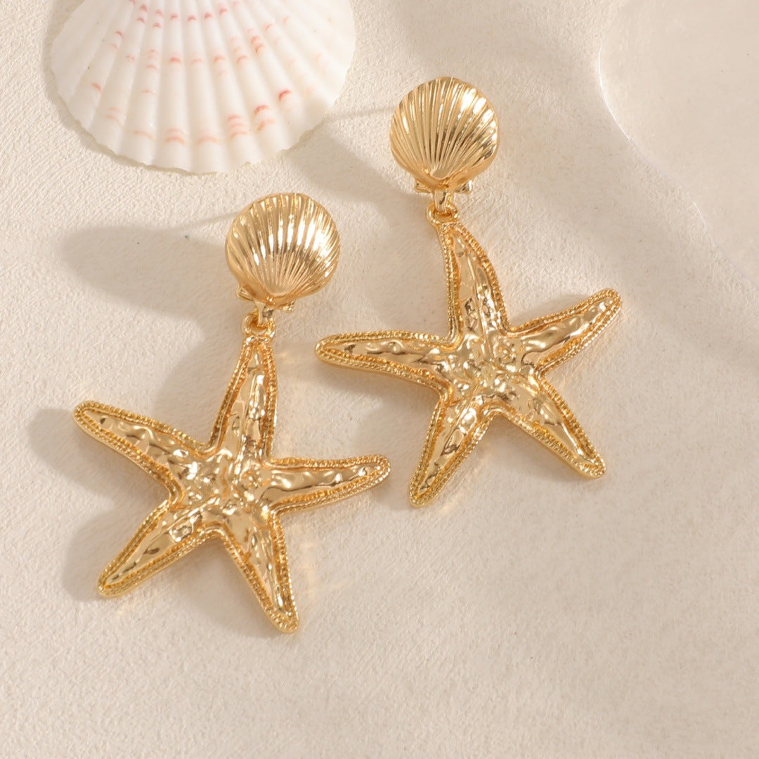 Women’s earrings in shell design Nin Boutique