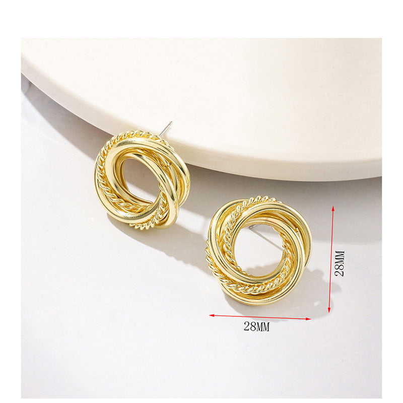 Women’s earrings with intricate braided design Nin Boutique