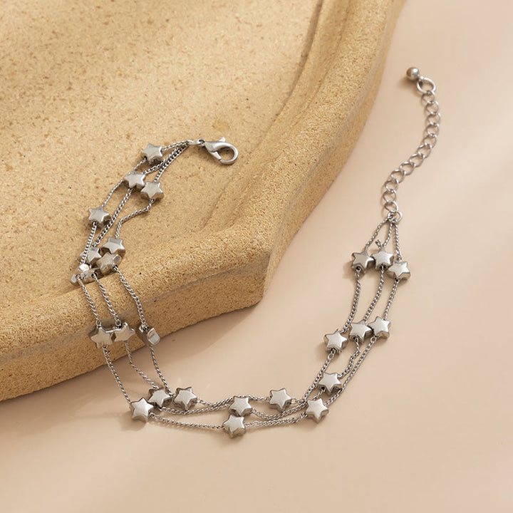 Ladies glamorous anklet with sparkling stars Nin Boutique