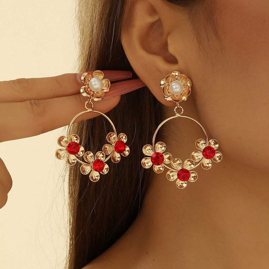 Women's earrings in luxurious floral pattern with pearl accents Nin Boutique